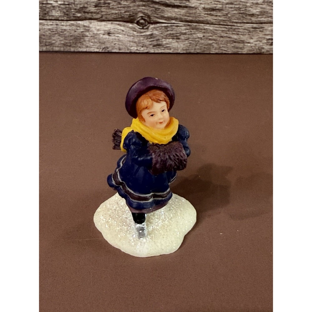 O'Well skating girl hand muff skater Christmas Village Figure